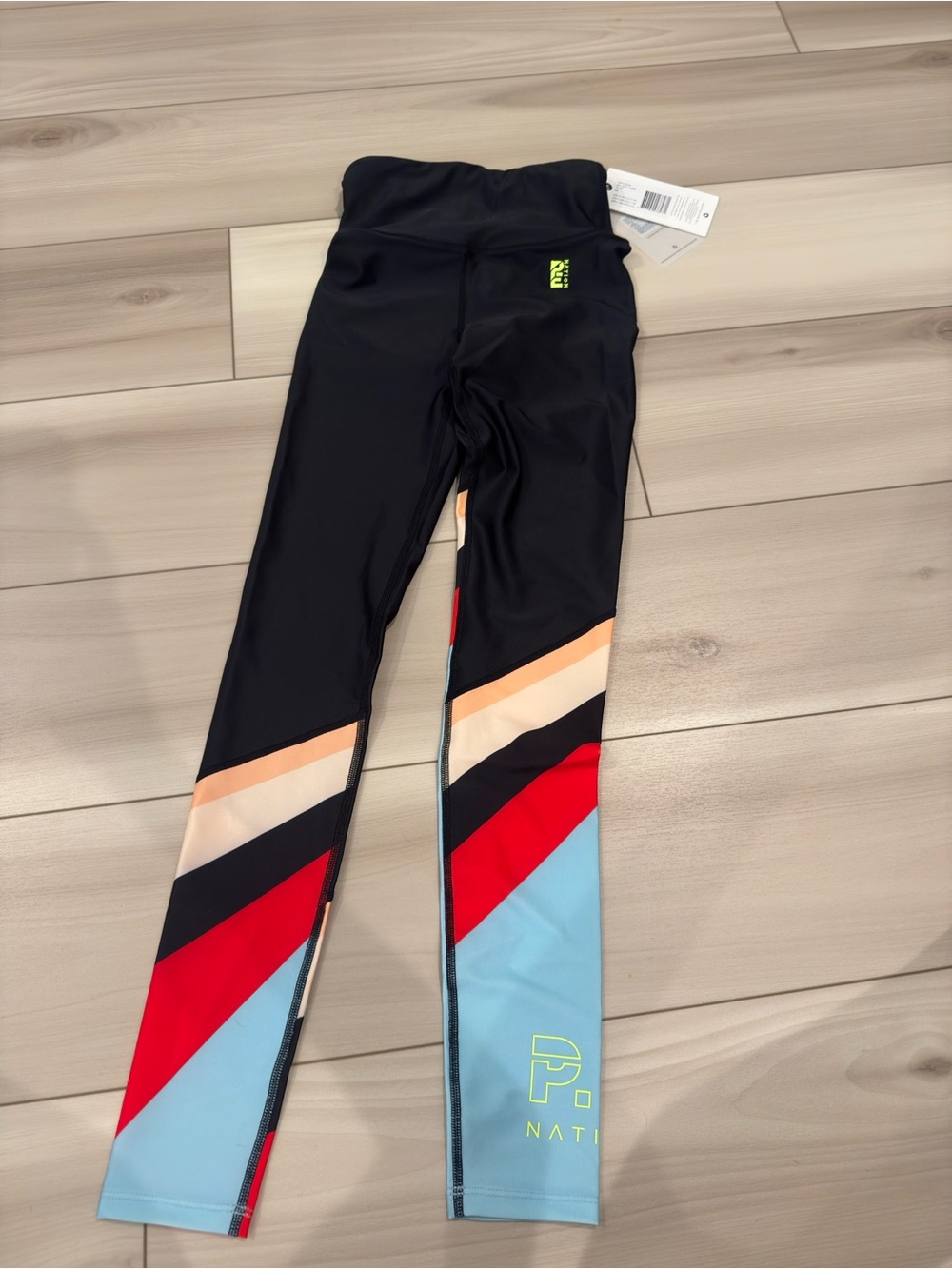 P.E Nation Kids Black Leggings with Red, Light Blue & Peach Panels